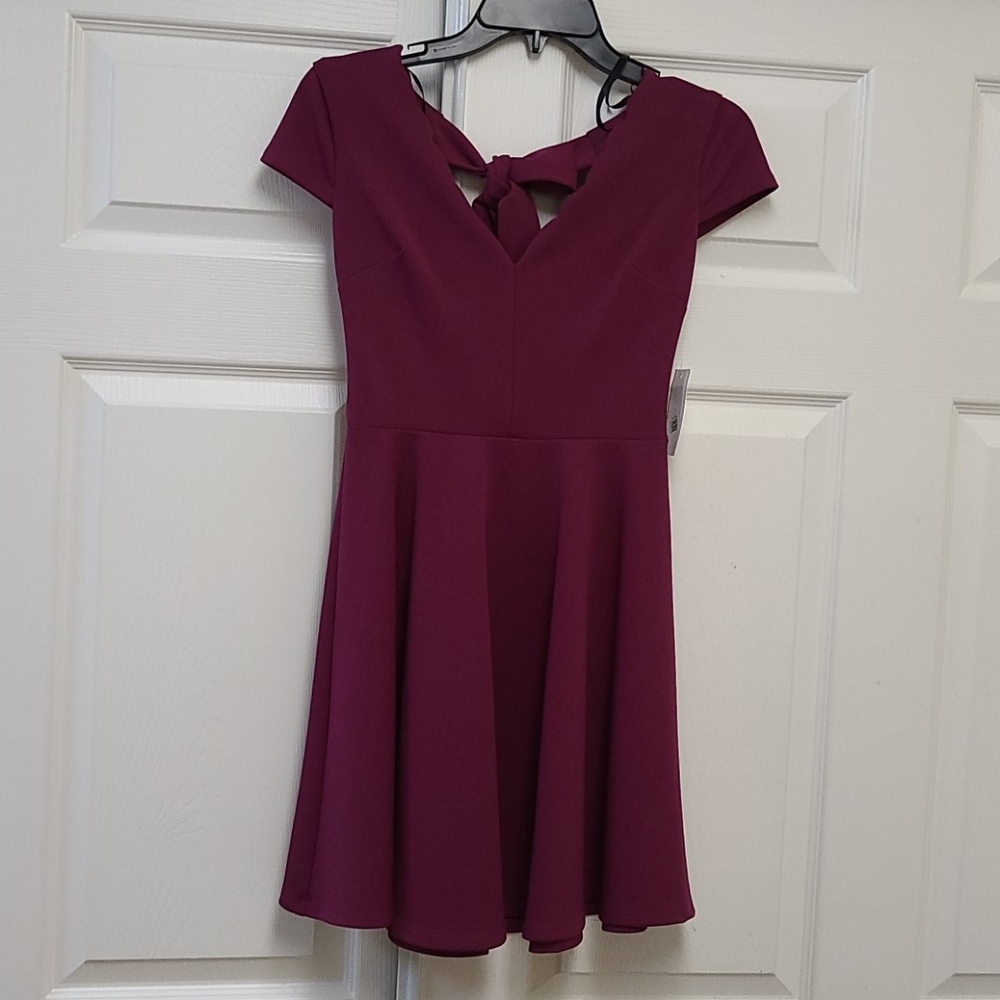 B .Darlin purple dress size 4